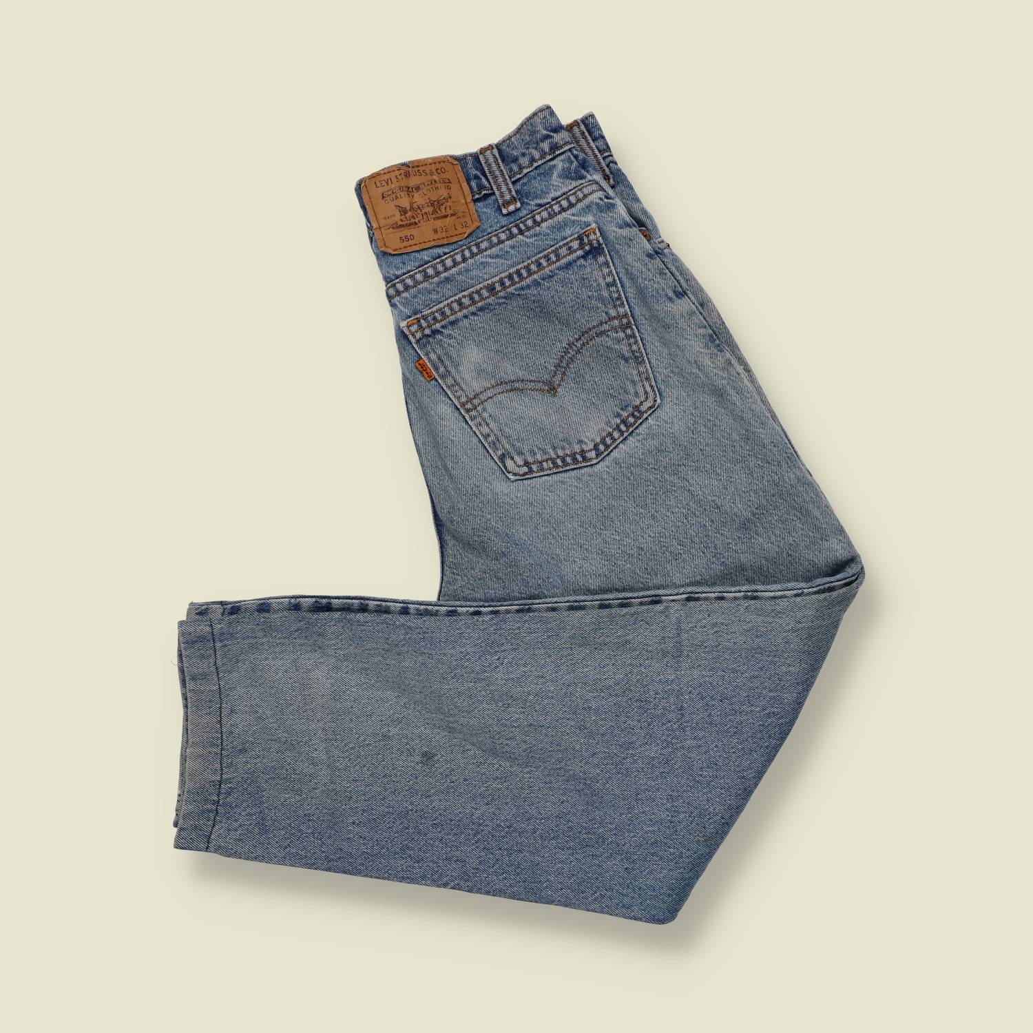 1990s | Levi’s Orange Tab 550 | Made in USA – Light Wash - w26