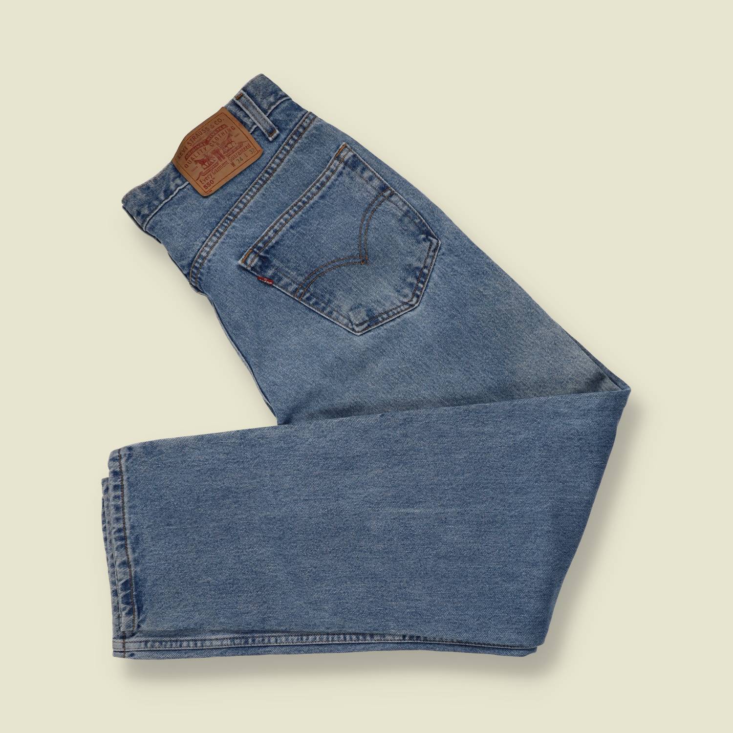 1980s-90s | Levi's | Mid-Wash Blue 550 Relaxed Fit Jeans - Made in Mexico - w34