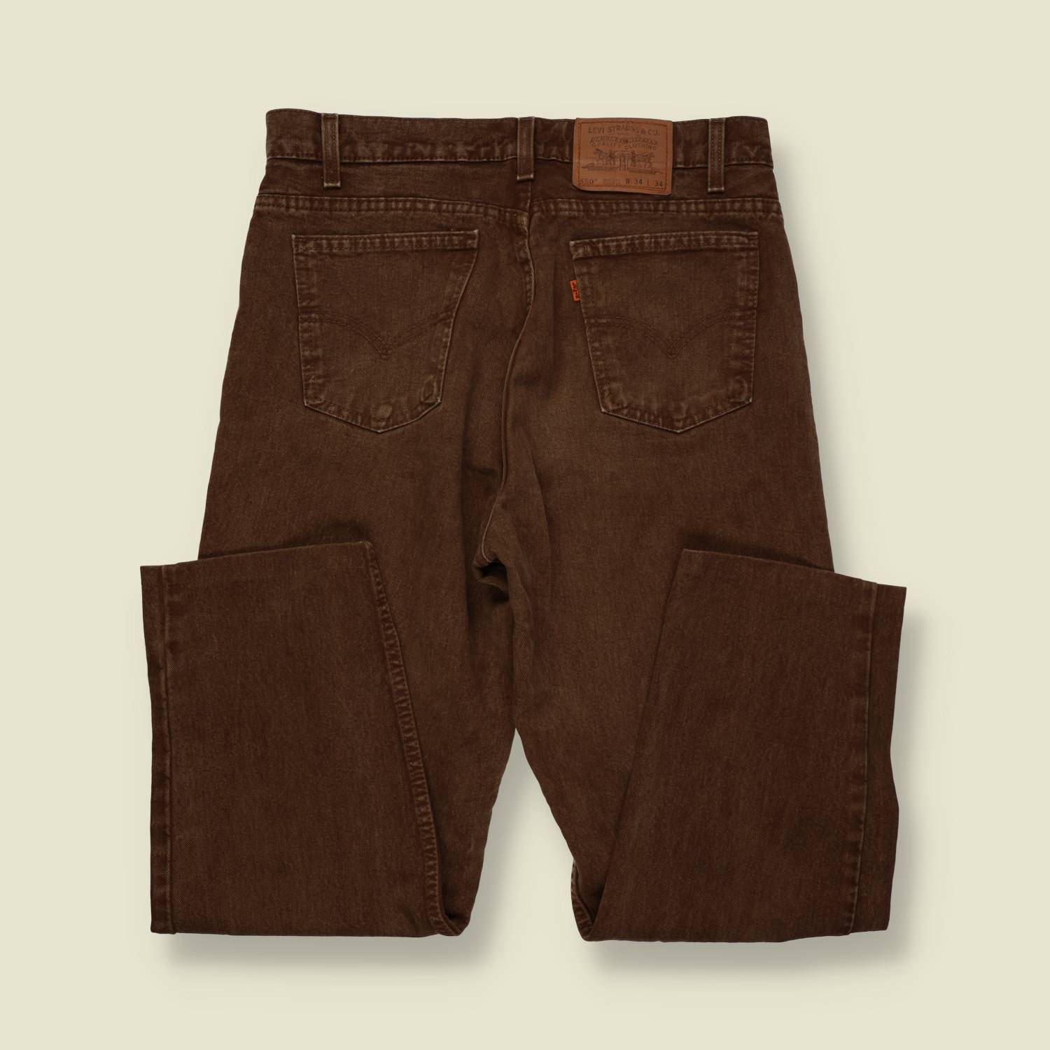 1980s–1990s | Levi’s 550 | Orange Tab | Straight Leg Jeans | Made In USA | Brown - w32