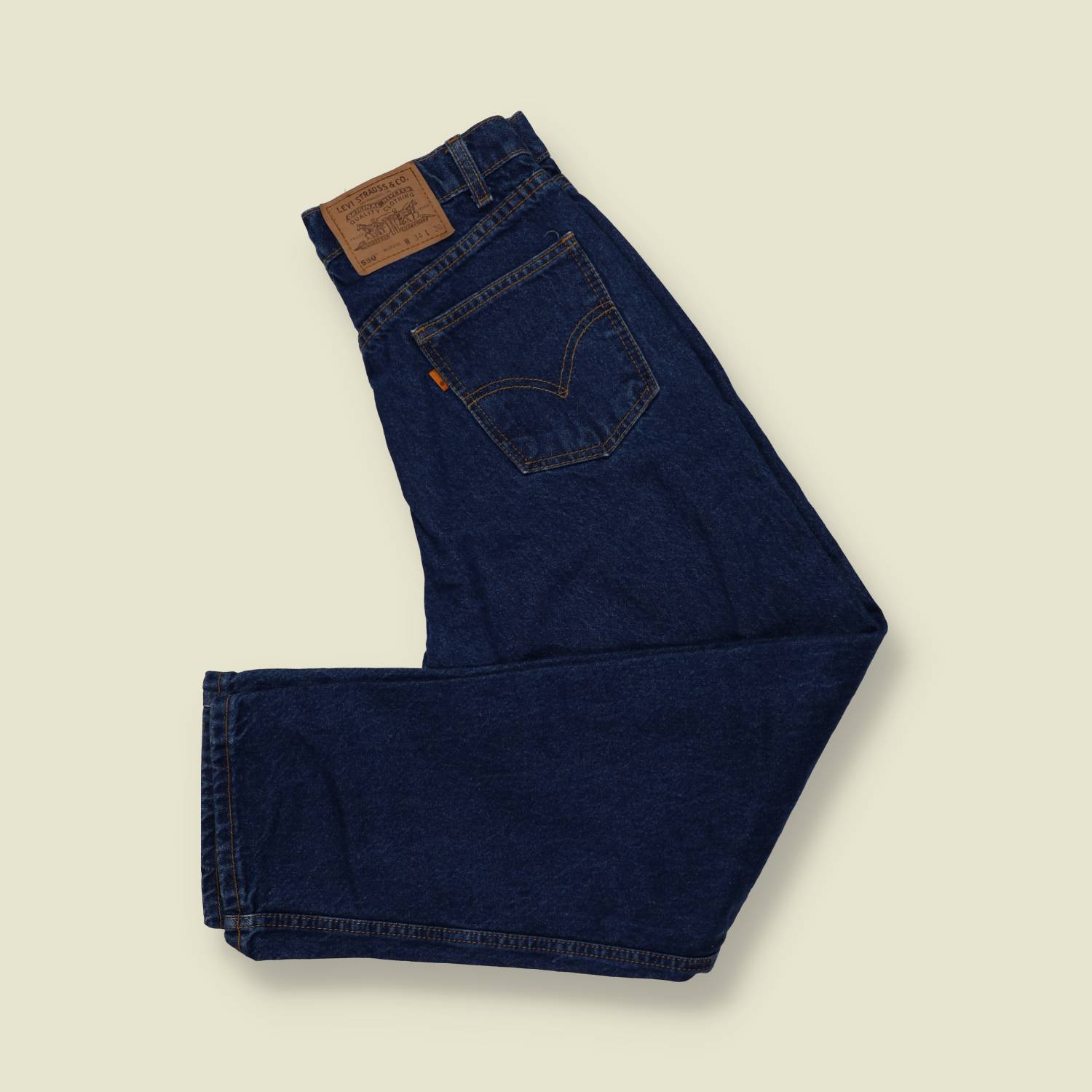 1980s–1990s | Levi’s | Orange Tab | 550 Jeans | Made In USA | Dark Blue - w30