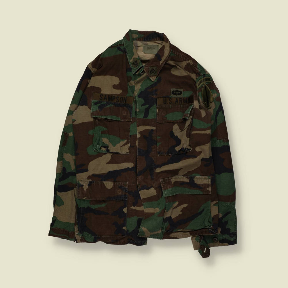 1980s–1990s | U.S. Army |  Woodland Camouflage BDU Field Shirt – S