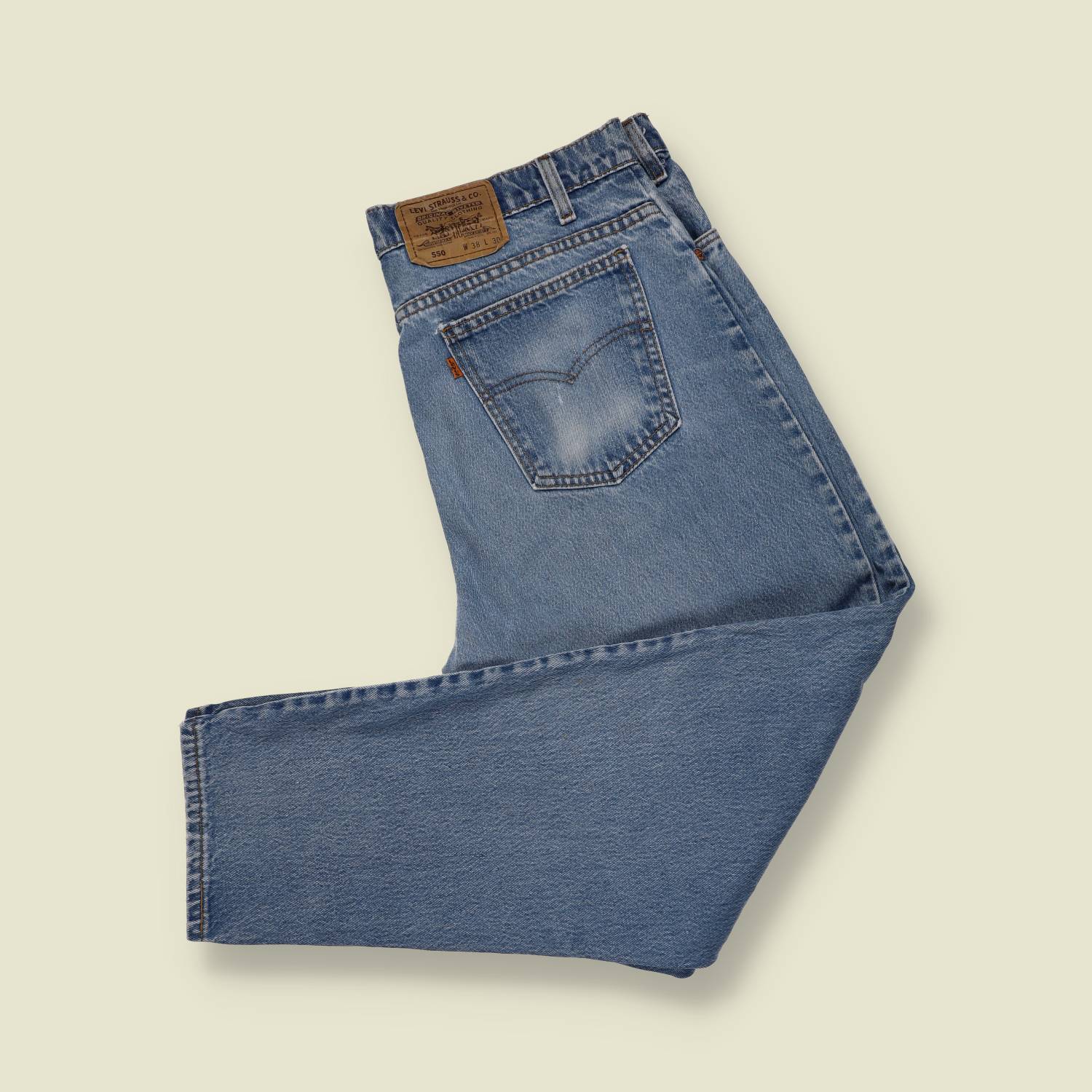 1990s | Levi’s Orange Tab 550 | Made in USA – Mid Wash - w36