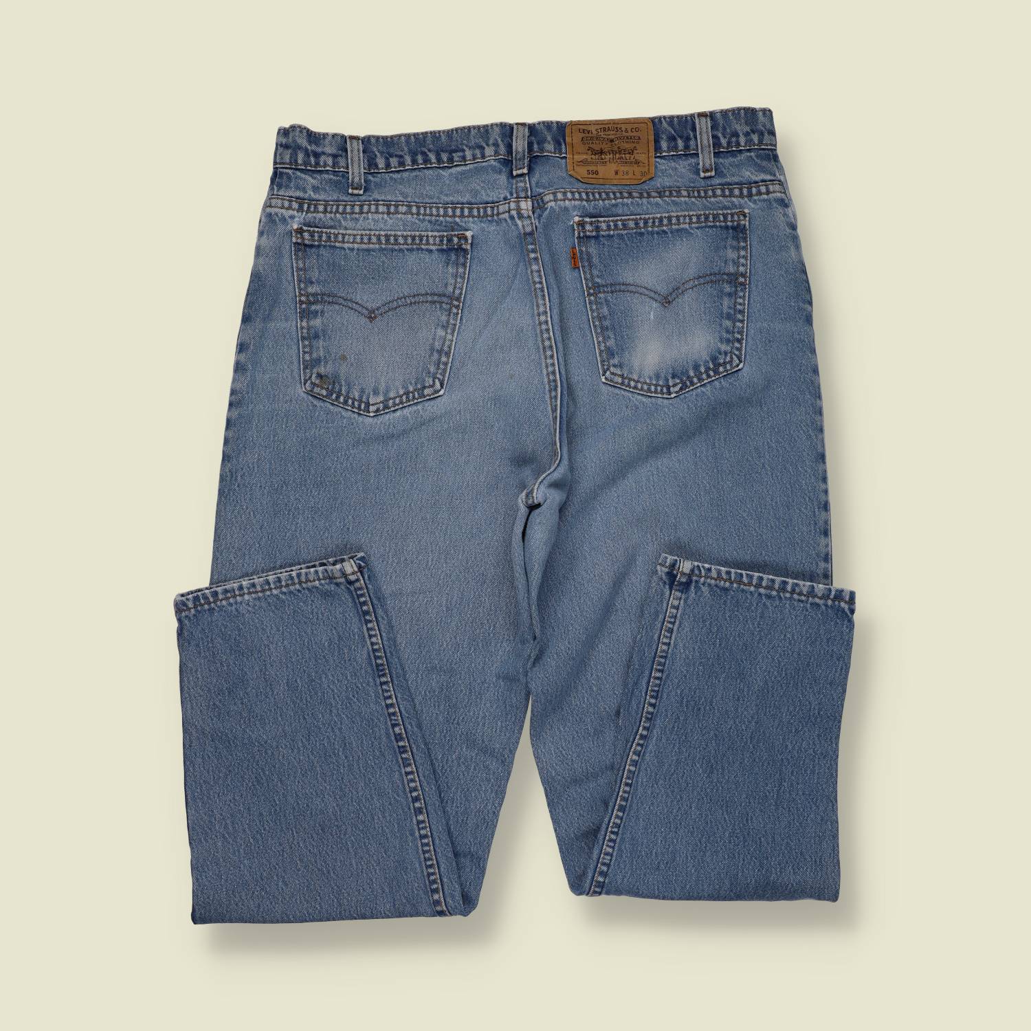 1990s | Levi’s Orange Tab 550 | Made in USA – Mid Wash - w36