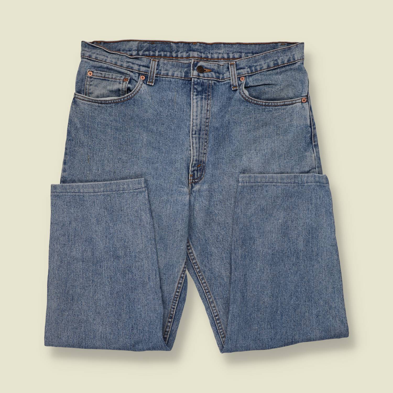 1980s-90s | Levi's | Mid-Wash Blue 550 Relaxed Fit Jeans - Made in USA - w38