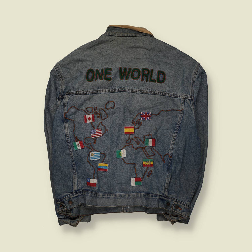 1980s | Custom Denim Jacket | “One World” Embroidered | Blue – XXXXL
